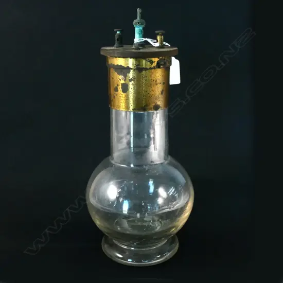 OLD GLASS BODIED WET CELL BATTERY WITH BRASS FITTINGS H. 310MM. 