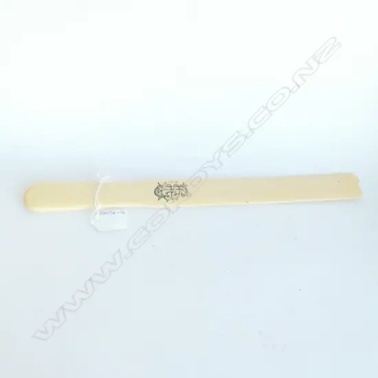 LARGE IVORY PAGE TURNER, ENGRAVED CREST. L 390MM. DAMAGE TO ONE END.