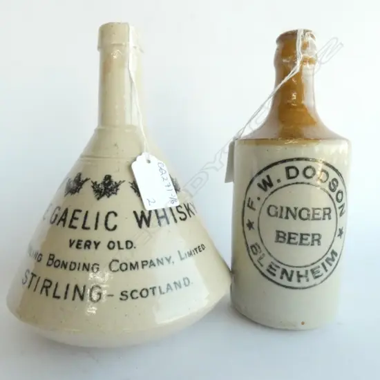 TWO STONEWARE BOTTLES; BLENHEIM GINGER BEER (H. 190MM) & GAELIC WHISKY (H. 210MM)