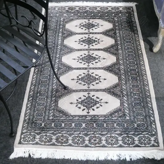 HAND KNOTTED WOOL PILE RUG, BEIGE COLOURS, 1660 X 990MM