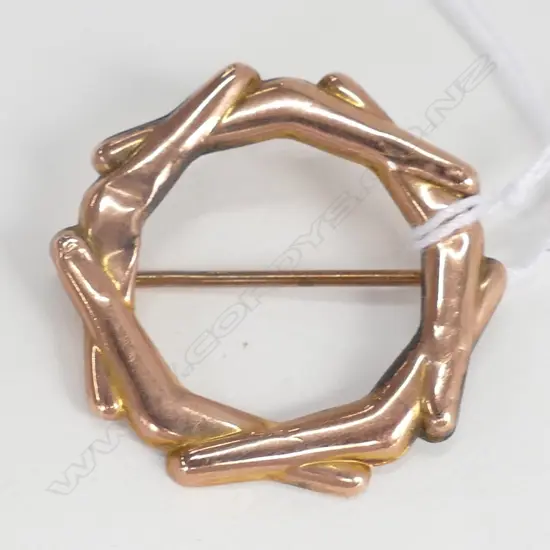 9ct GOLD CIRCLET BROOCH. 1.81gm