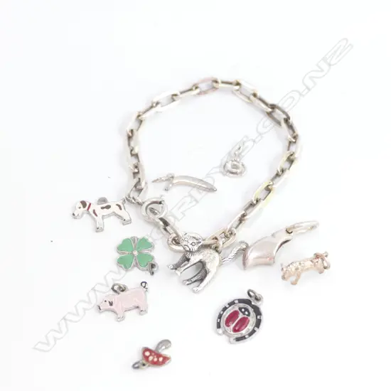 925 SILVER BRACELET AND 10 CHARMS
