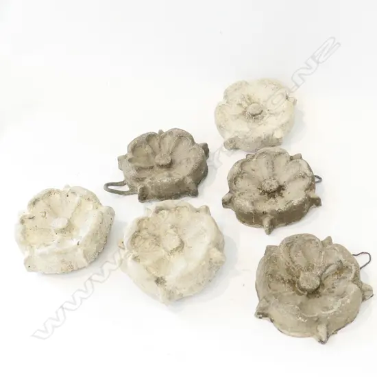 SIX SMALL DECORATIVE CONCRETE FLOWERS