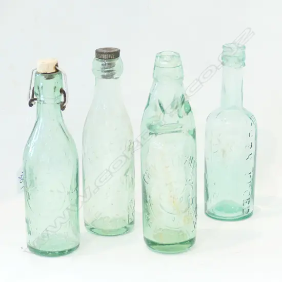 COLLECTION OF 4 CLEAR BOTTLES