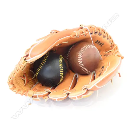 SOFTBALL GLOVE AND TWO LEATHER BALLS