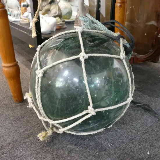 OLD LARGE GLASS FISHING FLOAT WITH NETTING