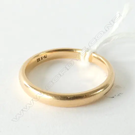 18CT WEDDER RING 4.9 GRAMS