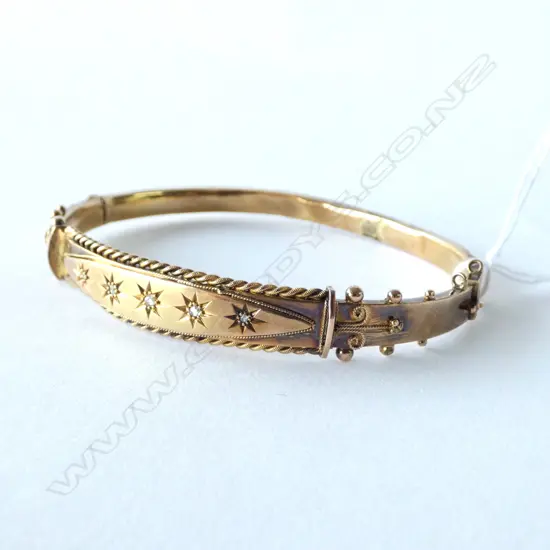 VICTORIAN 9CT GOLD & DIAMOND BANGLE (dented) 9.4gms