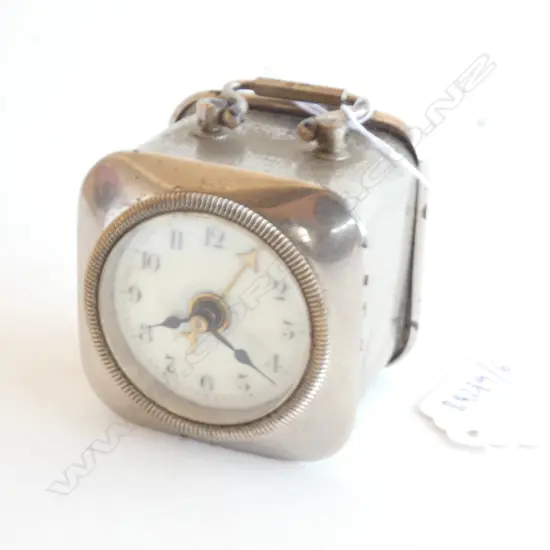 SMALL VINTAGE GERMAN ZINC CASED TRAVEL CLOCK w ALARM (NEEDS KNURLED NUT ON ALARM ADJUSTMENT) 