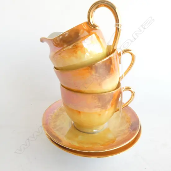 PAIR ORANGE LUSTRE DEMITASSE CUPS/SAUCERS & CREAMER