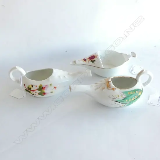 THREE ANTIQUE FEEDING CUPS. LARGEST L. 170MM