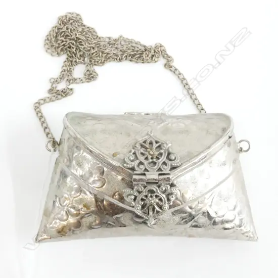 AN ARTS & CRAFTS SILVER-PLATED PURSE