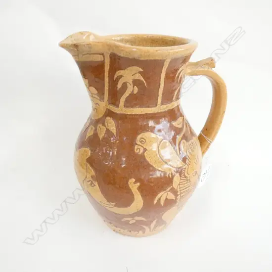  A RARE 19TH CENTURY LEAD GLAZED SLIPWARE JUG WITH UNUSUAL AFRICAN ANIMAL DECORATION H.220mm RESTORATION TO SPOUT