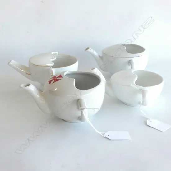 TWO VINTAGE FEEDING CUPS; ONE CROWN LYNN, ONE ENAMEL. BOTH DIA. 110MM