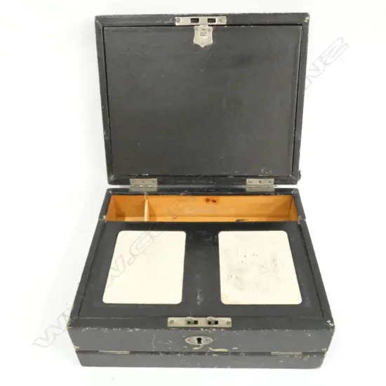 A SMALL LEATHER-BOUND TRAVELER’S WRITING SLOPE AF