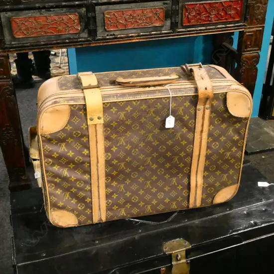 VINTAGE LOUIS VUITTON SUITCASE; CONSIDERABLY WORN & REPAIRED