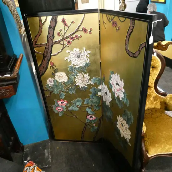 A DOUBLE CHINESE SCREEN WITH FLOWERS AND GILDED BACK DROP