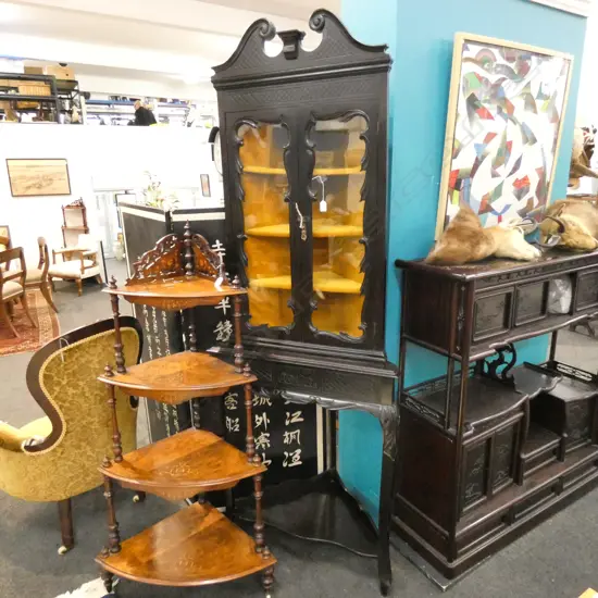 EDWARDIAN EBONISED TWO PIECE STANDING CORNER CABINET