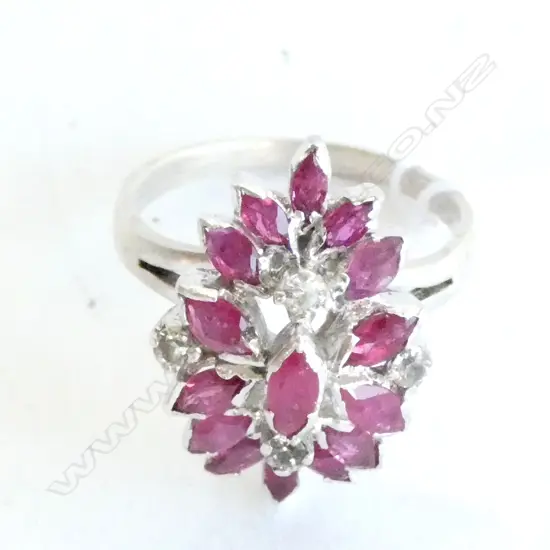 SILVER AND RUBY RING (LOW GRADE RUBIES)