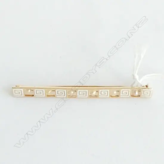 A 14ct. gold enamel and pearl brooch