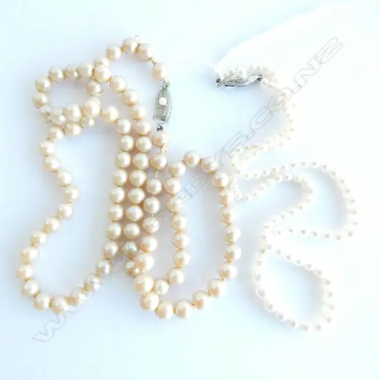 STRING OF CULTURED PEARLS - SILVER CLASP PLUS ONE OTHER.