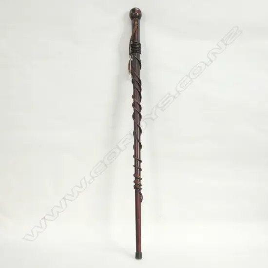 A VINTAGE MAORI WALKING STICK WITH INLAID PAUA AND SUPPLEJACK DECORATION 