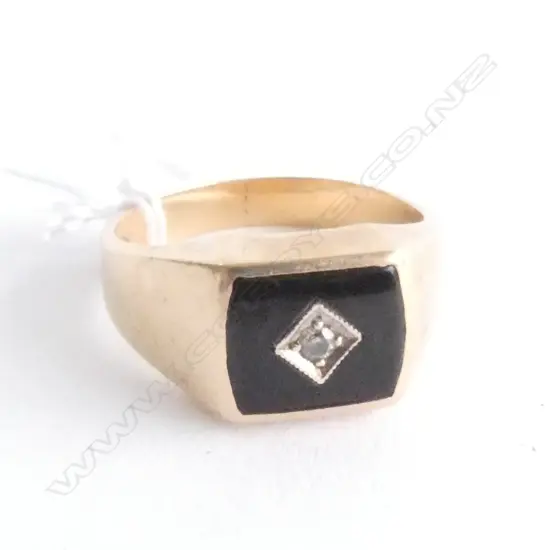 SIGNET RING WITH .03 CARAT STONE 4.6gm