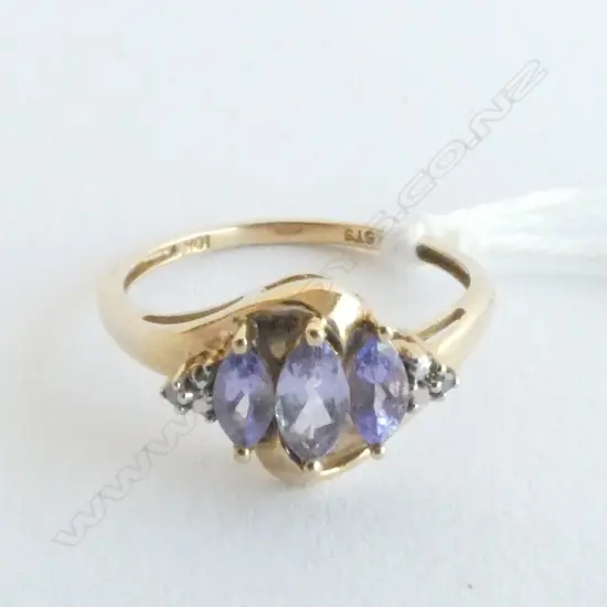 PURPLE STONE RING SET IN 10K GOLD