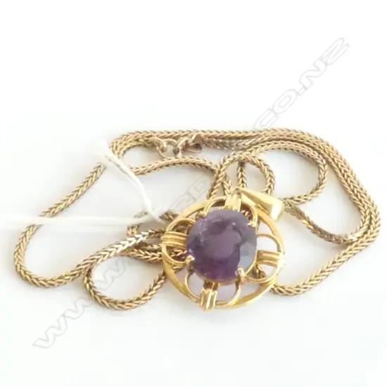 18CT GOLD AMETHYST PENDANT ON 9CT CHAIN