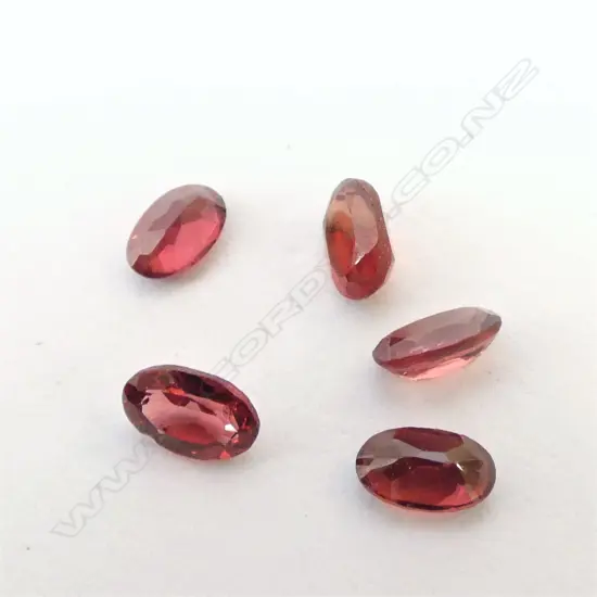 FIVE UNSET RICH RED GARNETS. EACH 1.8CT 