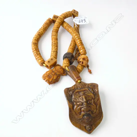 ORIENTAL NECKLACES; ONE WITH SCULLS 