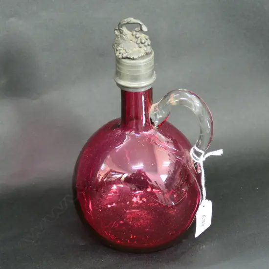 CRANBERRY GLASS DECANTER, APPLIED HANDLE, PEWTER STOPPER & COLLAR