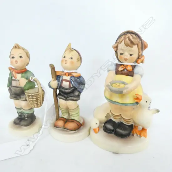 THREE HUMMEL FIGURES; FEEDING TIME GIRL, LITTLE HIKER, VILLAGE BOY, TALLEST 115MM