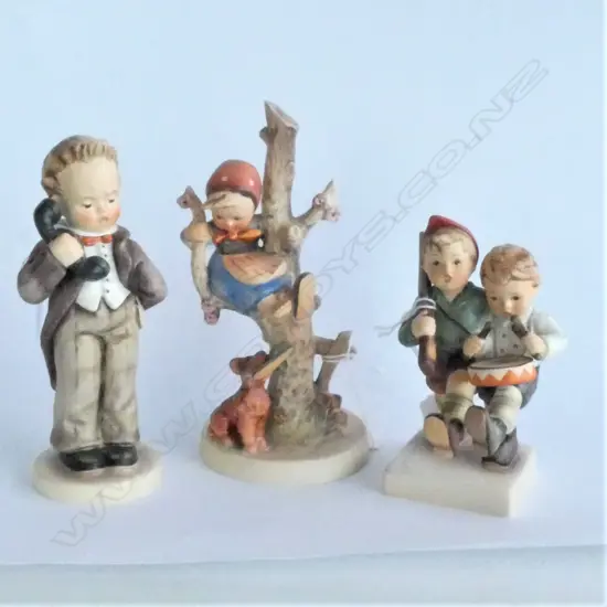 THREE HUMMEL FIGURES; HELLO, VOLUNTEERS, GIRL IN APPLE TREE. TALLEST 170MM