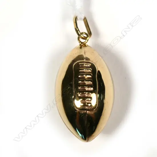 9CT GOLD RUGBY BALL CHARM L. 25MM 1.07GMS