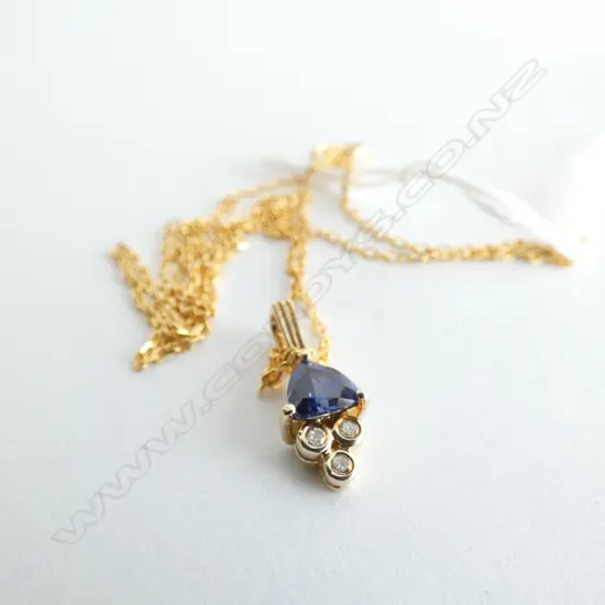 9ct 3 DIAMOND & BLUE SYN SAPP. PENDANT ON SILVER GILT CHAIN