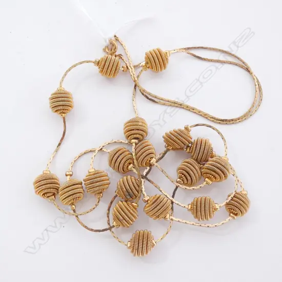 GOLD TONE LONG TEXTURED BEEHIVE COIL NECKLACE 