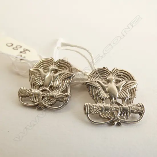 PAIR OF SILVER CUFF LINKS