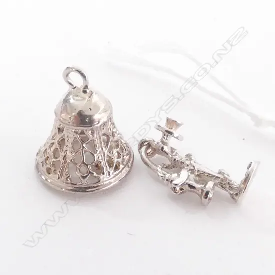TWO SILVER CHARMS