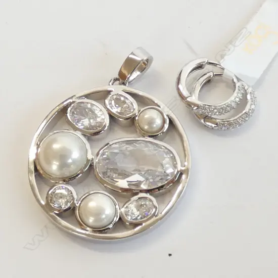 CIRCULAR KAGI PENDANT & EARRINGS