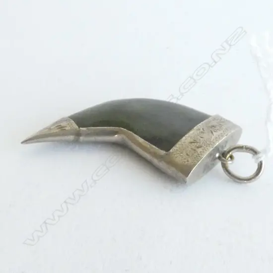 ANTIQUE GREENSTONE PENDANT SET IN STG SILVER IN SHAPE OF WHALES TOOTH