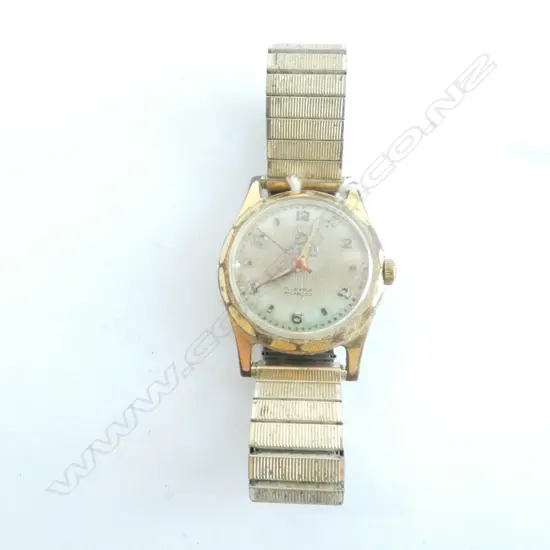 GENTS WRISTWATCH, ENGRAVED ON BACK, DATE 1957, UNICORN, WAS A ROLEX BRAND, APPARENTLY WORKING