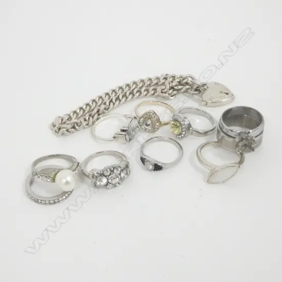 10 SILVER TONE COSTUME JEWELLERY RINGS & 1 BRACELET 