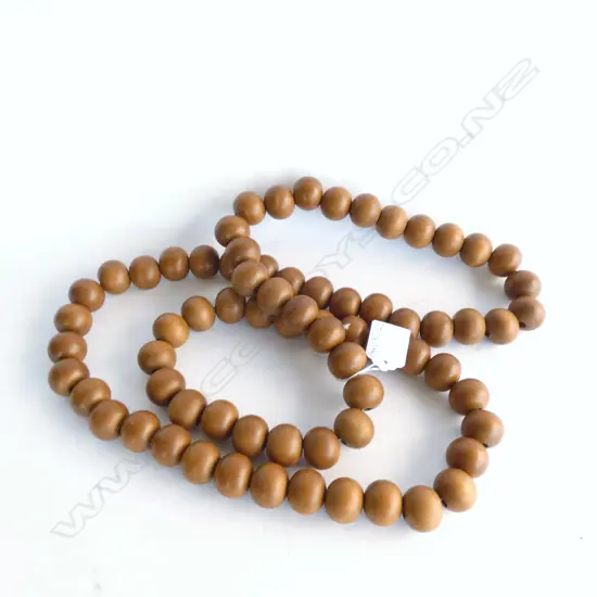 LG STRING ORIENTAL HARDWOOD BEADS. BEADS 10MM