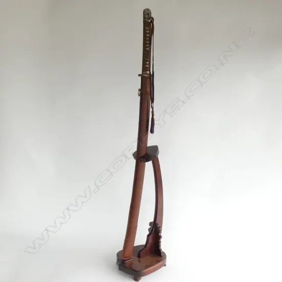 REPRODUCTION JAPANESE KATANA SWORD IN SCABBARD ON STAND