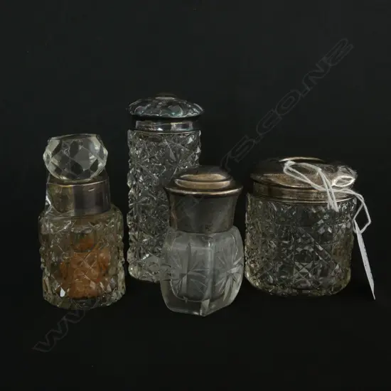 4 SILVER TOPPED SCENT BOTTLES 