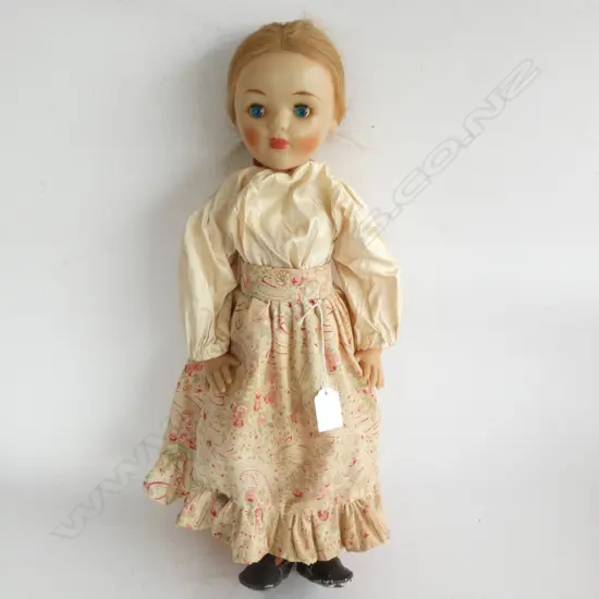 VINTAGE DOLL HARD PLASTIC. CLOTHED. PLAITED HAIR. H.465mmn