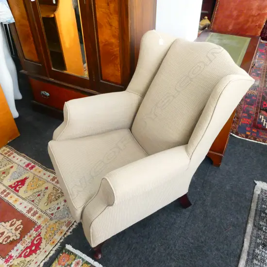 UPHOLSTERED WING BACK ARMCHAIR