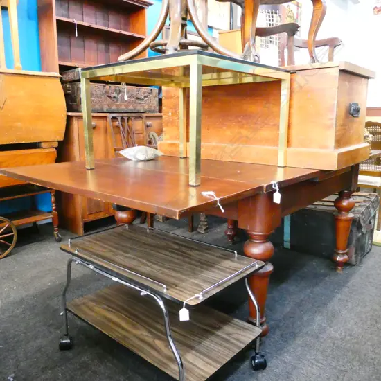 ANTIQUE KAURI EXTENSION TABLE ON CASTORS + 2 LEAVES  