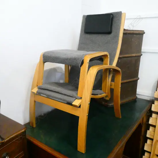 MODERNIST CHAIR WITH OTTOMAN